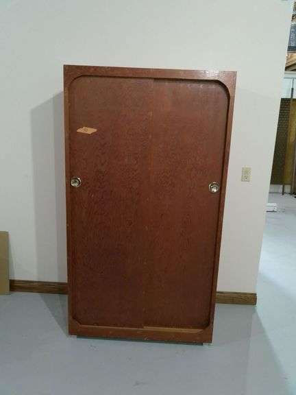 Wooden wardrobe sliding doors. 3.4 ft. X 2 ft. X 6.2 tall. Located in basement.