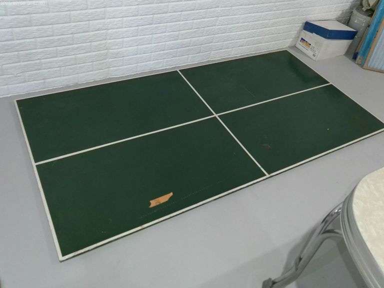Wooden table top ping pong table. 4 ft. X 8 ft. No accessories. Located in basement.