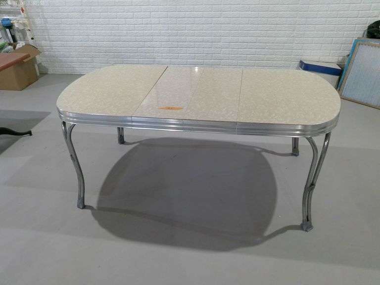 Arvin style table with 2 leaves. 3 ft. X 6 ft. Located in basement.