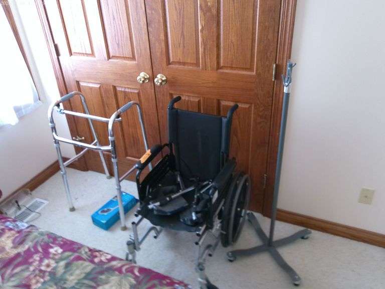 Convalescent items including a wheel chair, walker, oxygen pole, and one pair of walker wheels. Loca