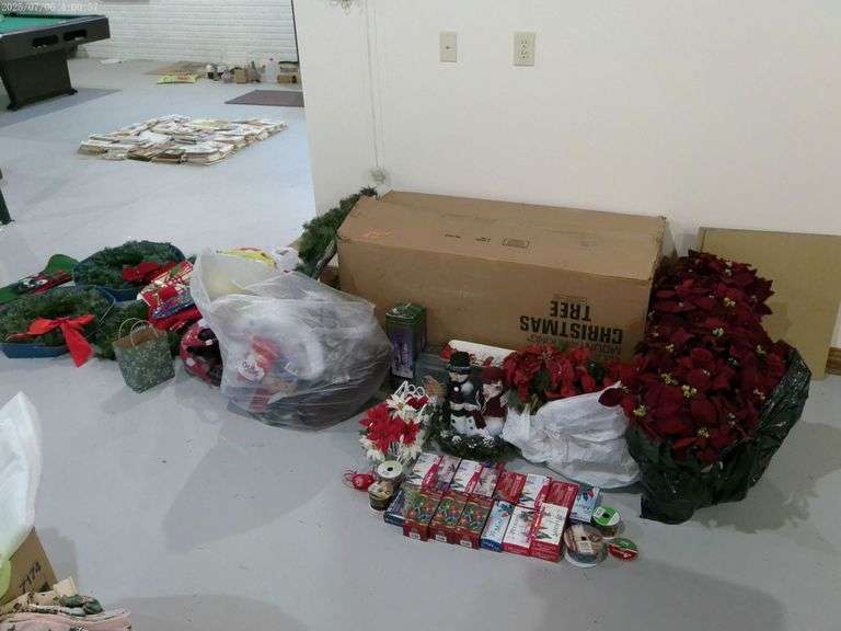 Large lot of Christmas, bows, wreaths,lights, large tree, poinsettias, & misc. Located in basement.