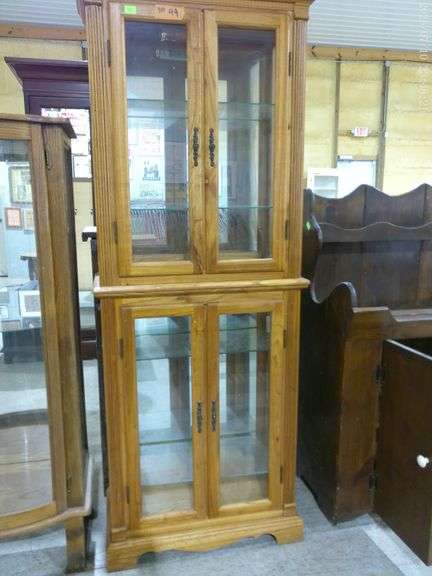 310 - 49 Show case with glass shelves. 28" wide x 14" deep x 72" tall