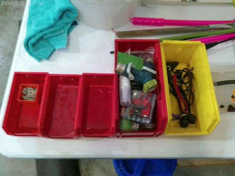 Contents of table top including cookware, cutting boards, warmers, desert tower, veggie trays, weed 