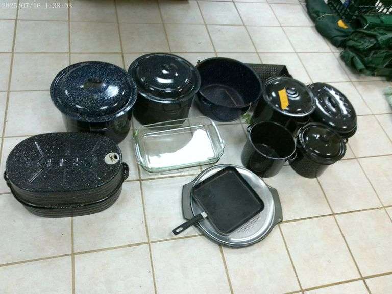 Large collection of enamel pots and canners, 2 glass baking dishes, pizza pan. In basement