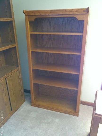 Oak bookcase, 4 adjustable shelves, 5' tall. Main level