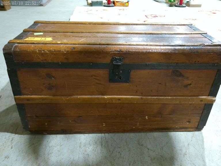 307 - 12 Wooden trunk 30" wide x 15" deep x 14" tall. Side handles are intact