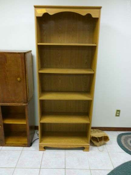 Bookcase, 4 adjustable shelves. In basement