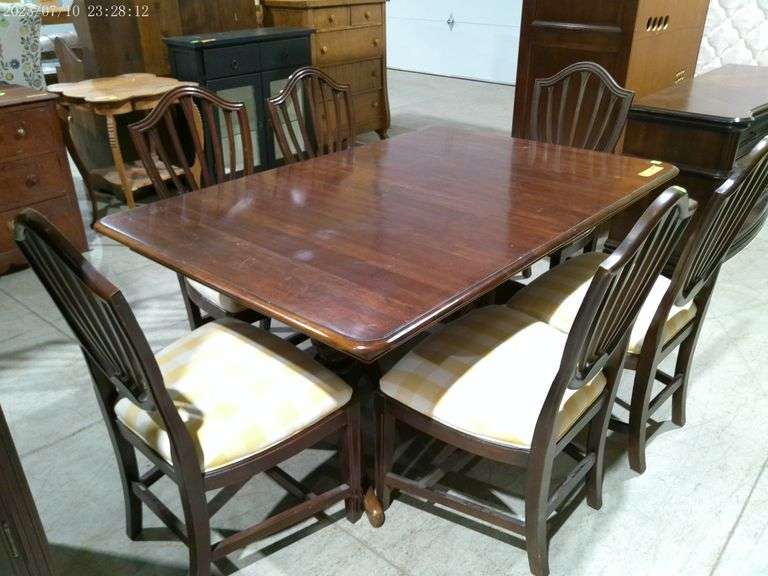 308 - 32 Dining table 6 upholstered chairs. 62" long x 42" wide