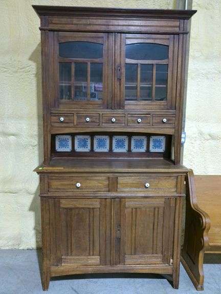 307 - 2 Farmhouse wooden hutch, multiple drawers, decorative tile accents. 45" wide, 84 " tall.