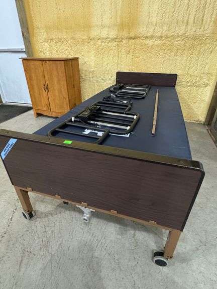 Pro basics hospital bed with mattress. Electric adjustment and side rails