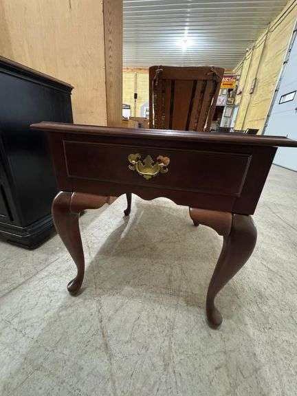 Mahogany Queen-Ann style End table with one dovetail drawer. Has Cabriole legs. 22" wide x 24" tall