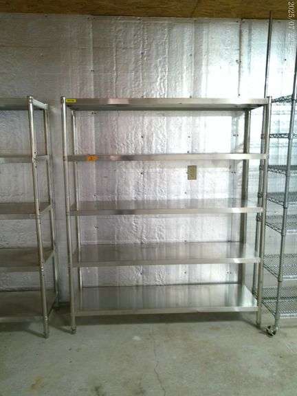 Stainless steel 4 tiered shelf 71 inches tall 50 inches wide