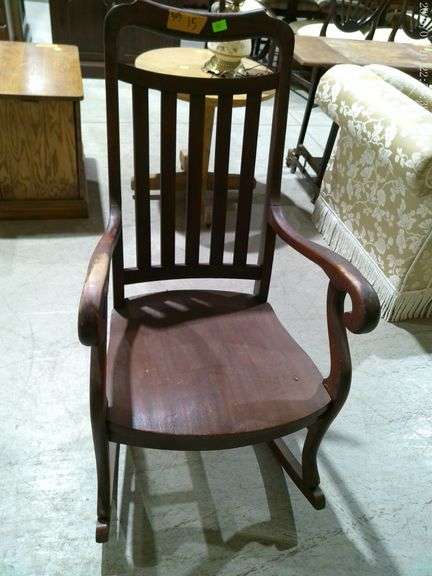303 - 15 Vintage solid wooden rocking chair