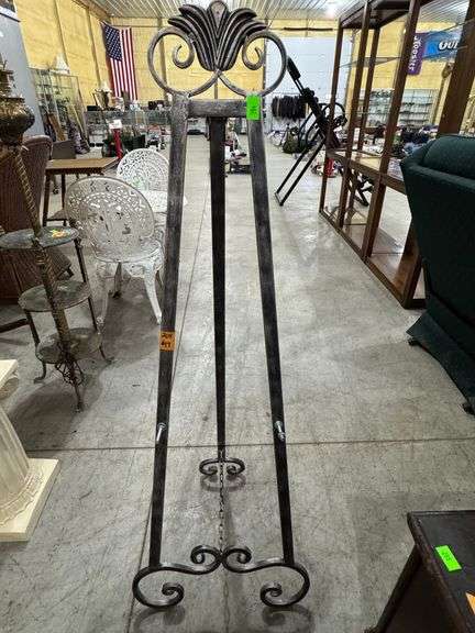 Metal floor display easel. 50" tall