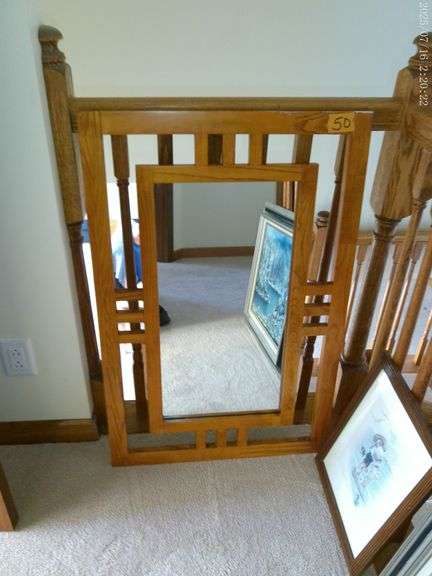 Decorative mirror with wood frame. 23"x36". Upstairs