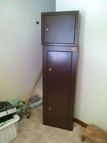 2 locking metal cabinets. 21"x18" and 21" x 55". Upstairs