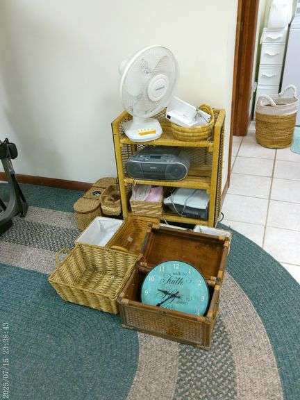 Misc baskets, fan, Sony boom box, Sunbeam heater, clock. In basement