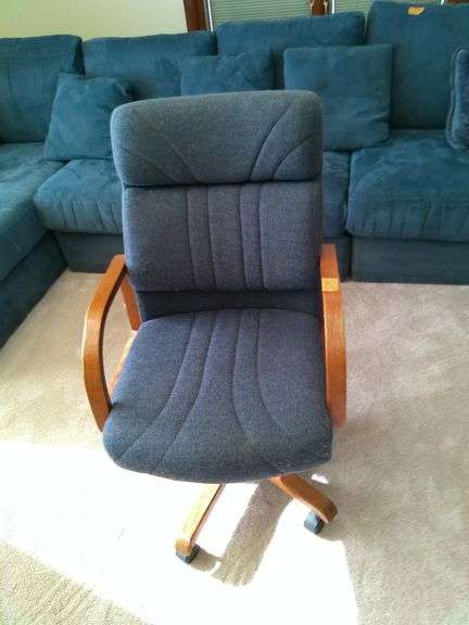 Office chair oak and blue upholstery. Main level