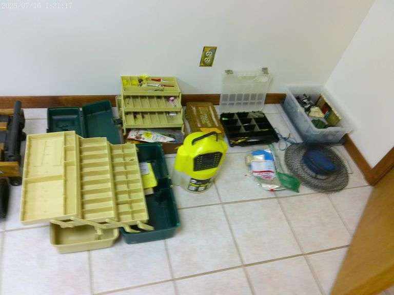 Large selection of tackle boxes, tackle, Flow Troll, reels. In basement