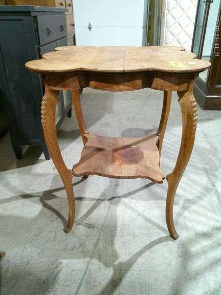 310 - 44 Antique parlor table with scalloped top and cabriole legs. Not stable