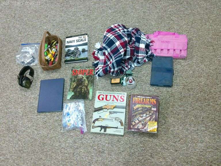 Gun and military books, shooting ear muffs, pistol magazines, miscellaneous ammunition, throw blanke