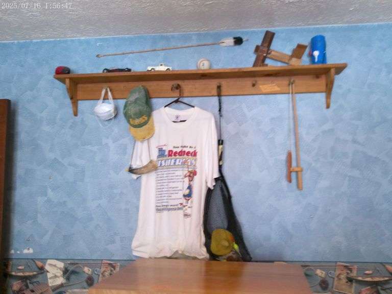 Misc decorative items, some fishing related. Shelf NOT included. Upstairs