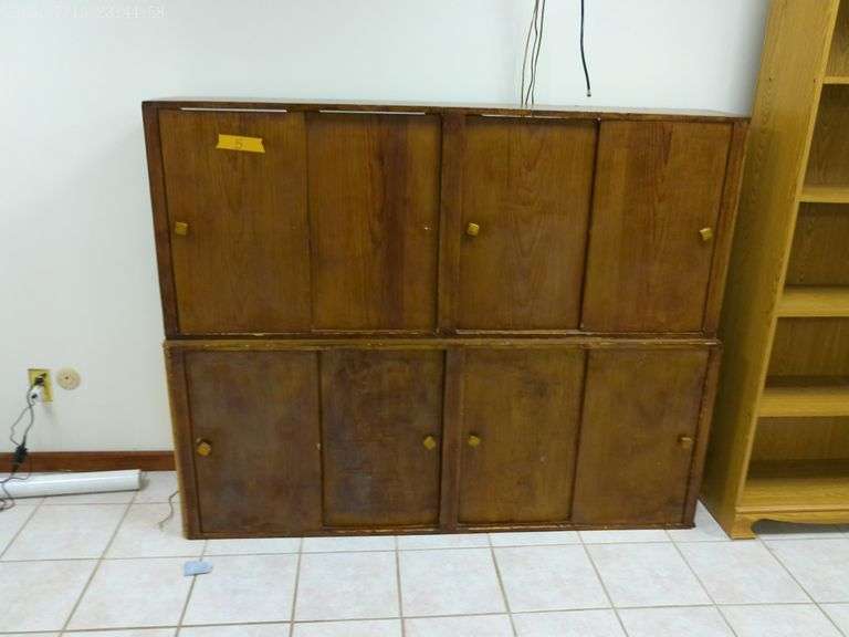 Wooden storage cabinets - 2 sections. In basement