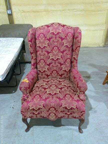 401 - Queen Anne style wingback upholstered chair in red floral fabric