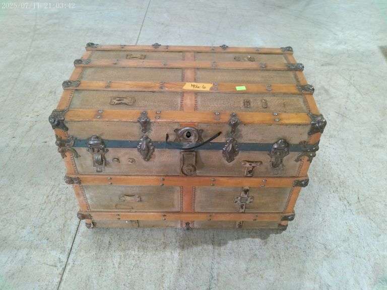 406 - flat top steamer trunk, no drawer inside, handles on ends are broken off