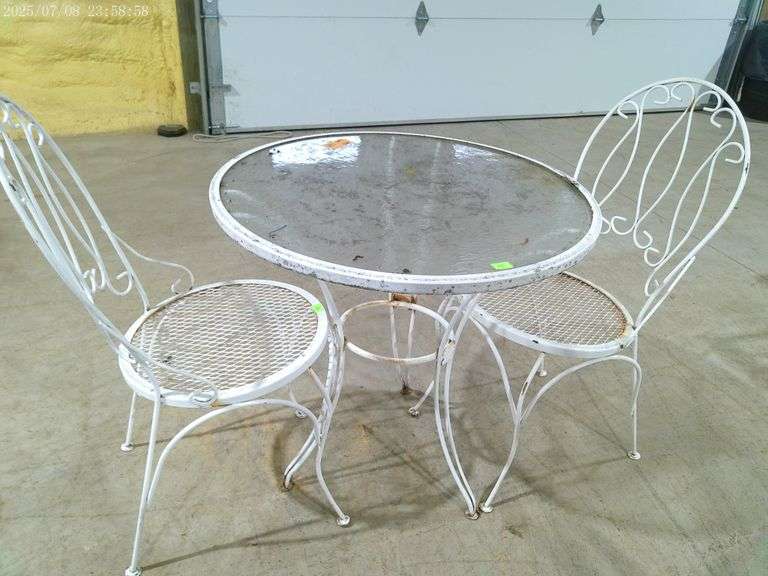 353 Wrought iron glass-top patio table and 2 chairs. 28" top