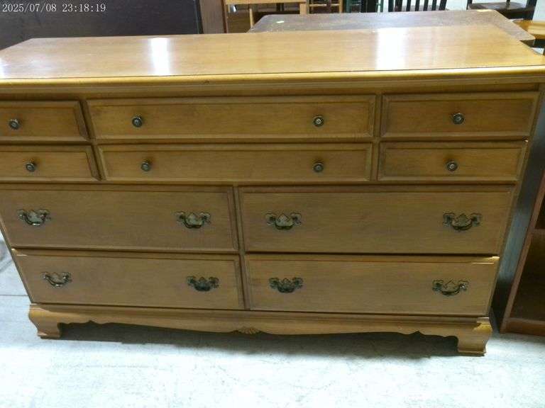 353 Early American dresser with 10 drawers. Very clean. 56 inch top.