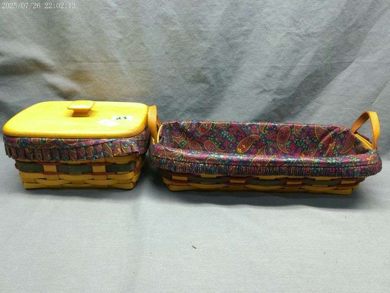 Longaberger 2 baskets with paisley liners, one has protector and lid 1996 & 1997