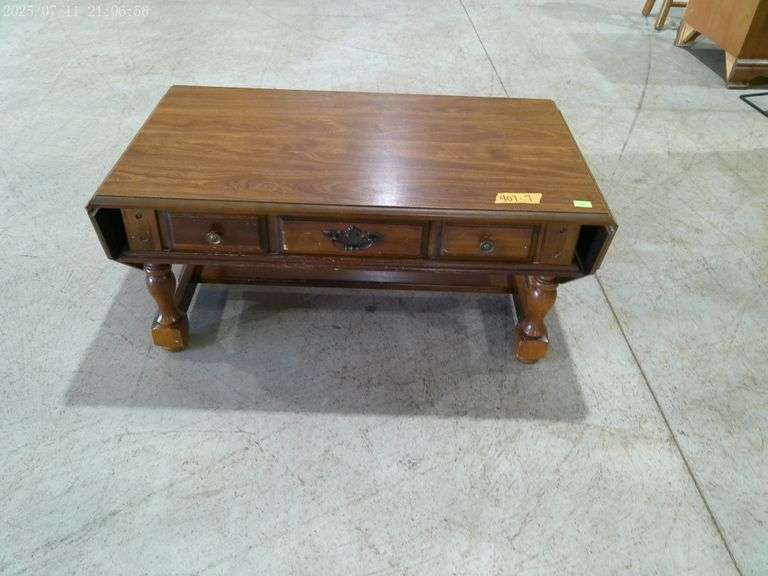 407 - coffee table with drop leaves on the ends and drawer