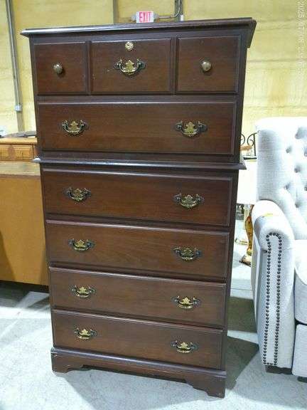352 Dark wood, chest of drawers with six drawers, top drawer has key.