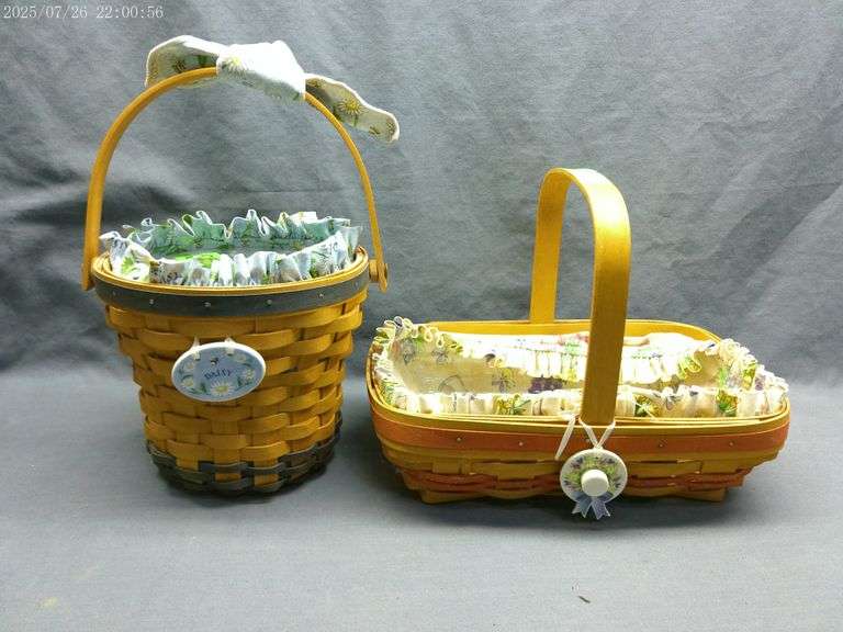 Longaberger Daisy basket with tie-on, liner, protector 1999; Early Blossoms basket with tie-on, line