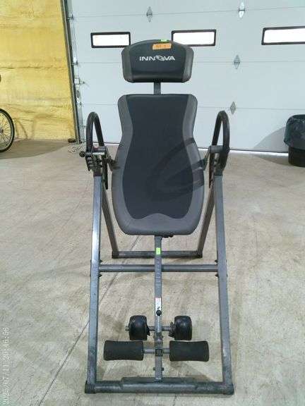 404 - Innova inversion table. Damage on ankle pieces and hand rails