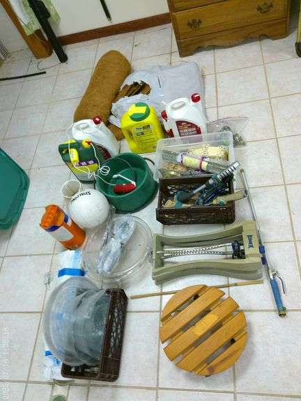 Misc lawn items, heated dog bowl, sprinkler, sprayers, volleyball, grass mats for planters. In basem