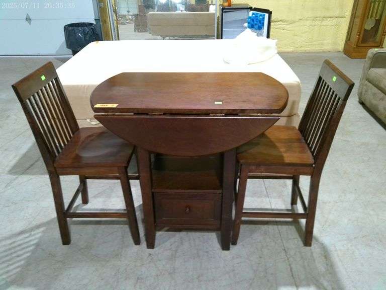 403 - Bistro table with drop leaves and 2 chairs. Length is 40", drawer below, leaves up width is 40