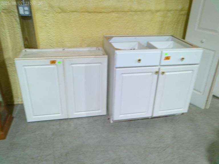 503- Hanging double door cabinet and base cabinet. Hanging cabinet is 36" wide x 13" deep x 30.5" ta