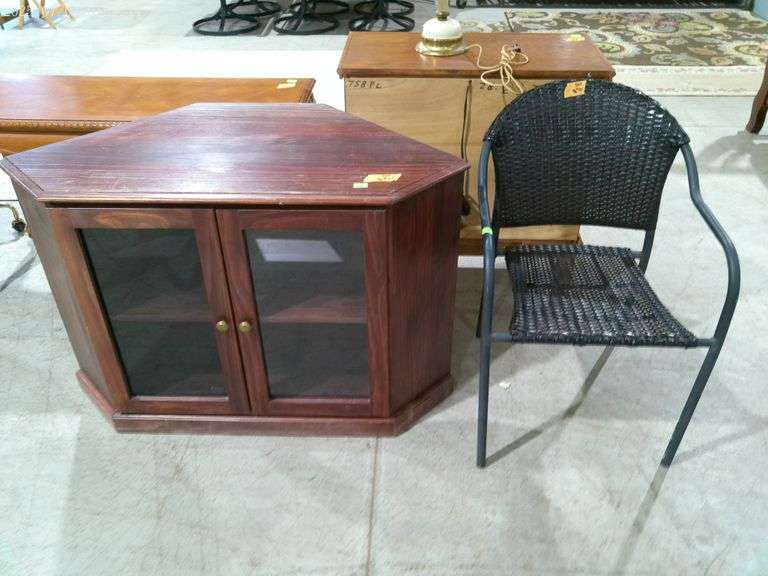 504- Corner entertainment cabinet with lower storage and plastic woven chair