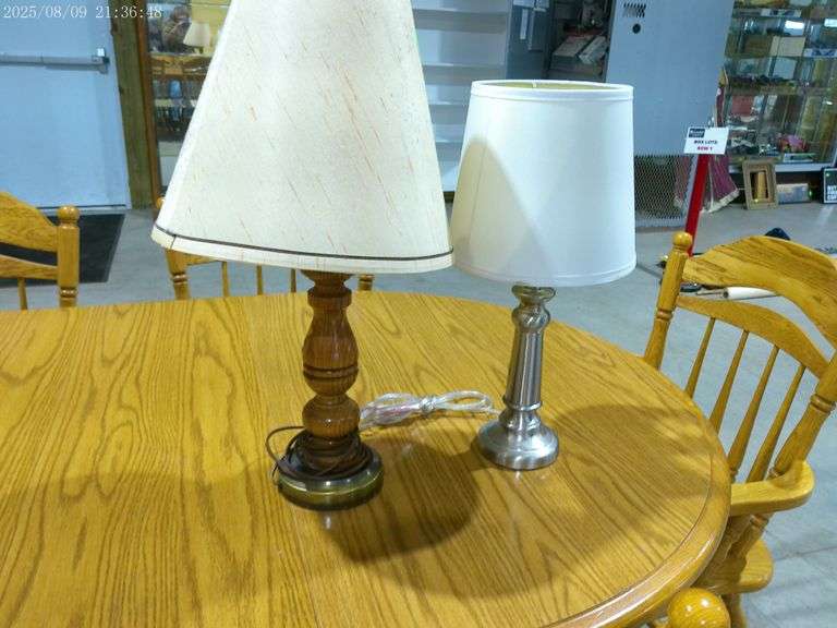 452 - 2 dresser lamps, oak base lamp is 22"; brushes nickel base is 18"