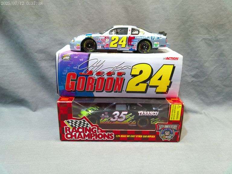 2 die cast 1:24 scale cars - Todd Bodine, Jeff Gordon. In boxes