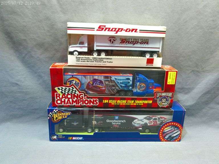 3 die cast 1:64 scale haulers, in boxes