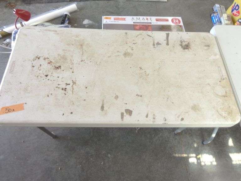 2 Fold Up Tables. The smaller one is a lifetime table. The larger one is made by PDG. See pictures. 