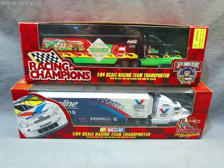 2 die cast 1:64 scale haulers, in boxes