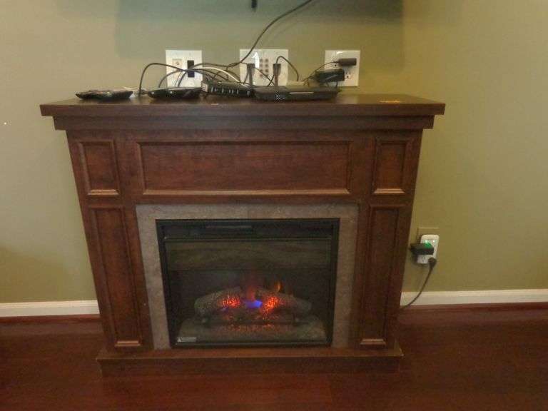 Electric Fireplace. No remote control. Minor veneer damage. 43" wide x 37" tall x 13.5" deep. See pi