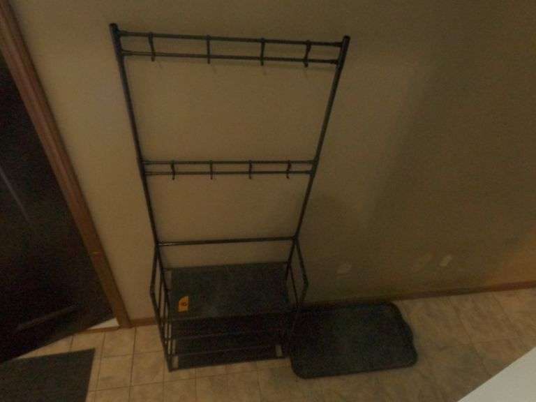 Plastic Coat Rack/Shoe Organizer and Boot Tray. See pictures for condition. Located by front door.
