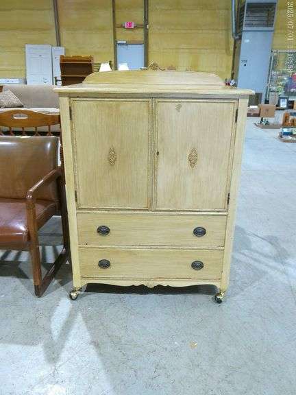 504- Armoire or cabinet with two-tone finish, wooden drawers, 35"x22"x45", on rollers