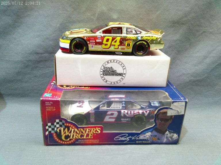 2 die cast 1:24 scale cars - Bill Elliott, Rusty Wallace. In boxes