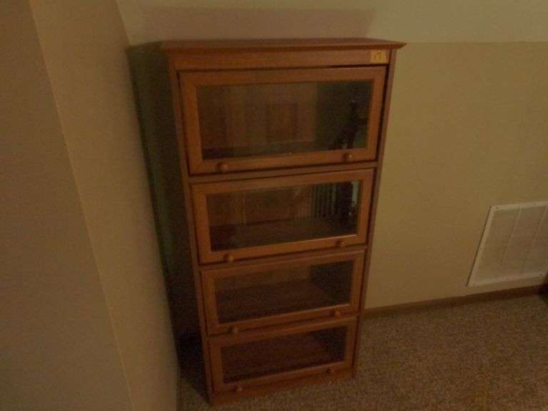 4 Shelf Bookcase with Glass Doors. 30" wide x 60" tall x 12" deep. See pictures for condition. Locat